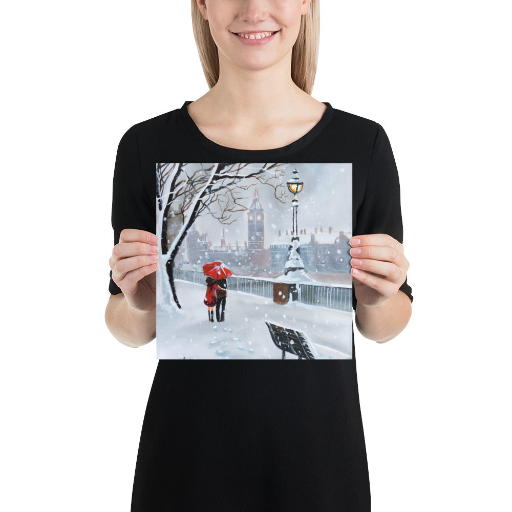 London print,  a couple with a red umbrella walk through the snow