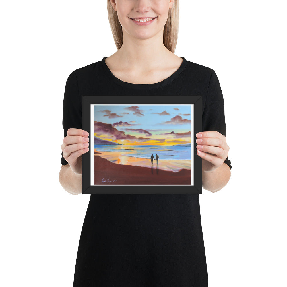 Couple at the beach, sunset Framed print