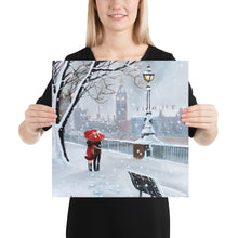 Load image into Gallery viewer, London print,  a couple with a red umbrella walk through the snow
